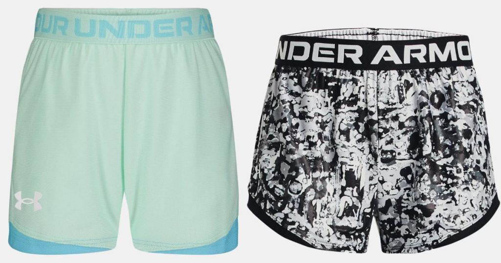 green and blue kids under armour shorts and black and white kids under armour shorts