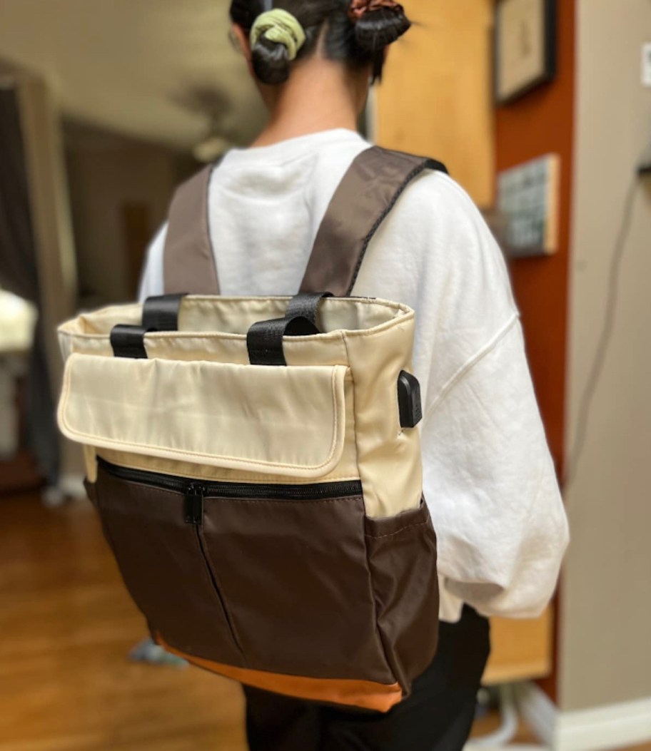 girl wearing backpack tote 