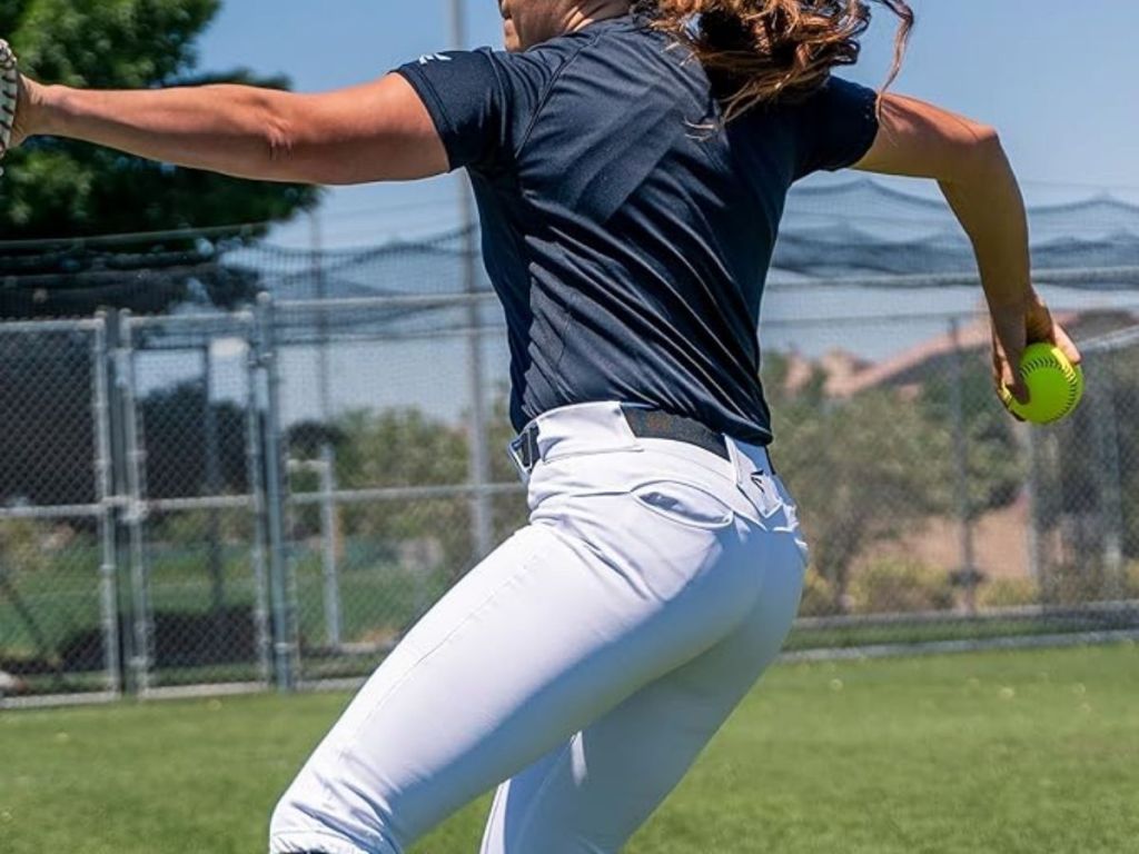 girl playing softball