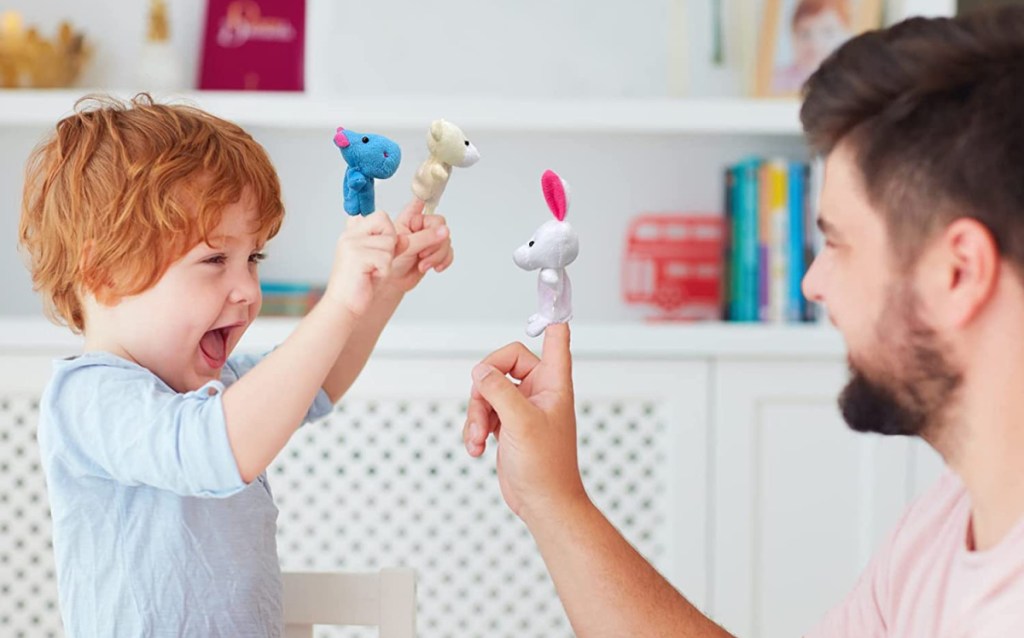 Son and Dad playing with finger puppets which make great non-candy easter egg fillers