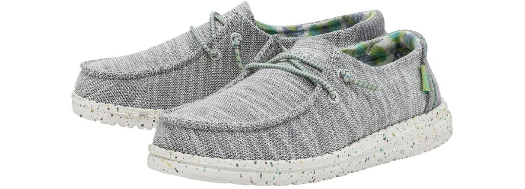 grey sneakers with speckled soles