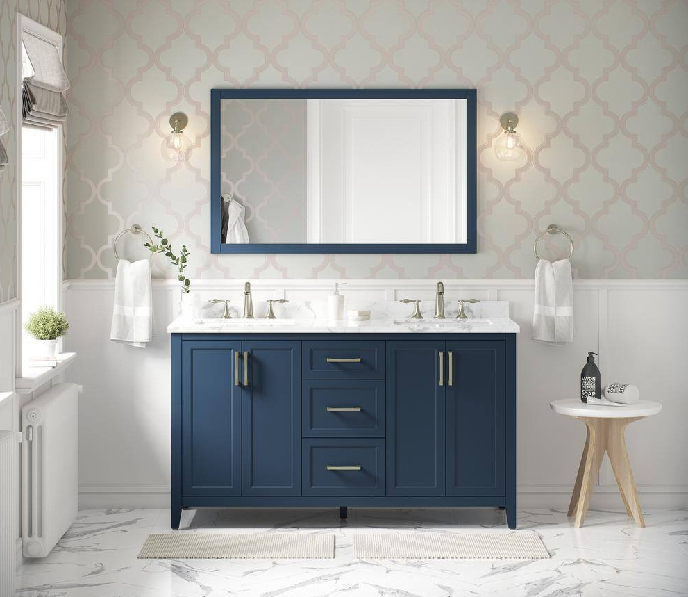 Bathroom with navy blue vanity and mirror