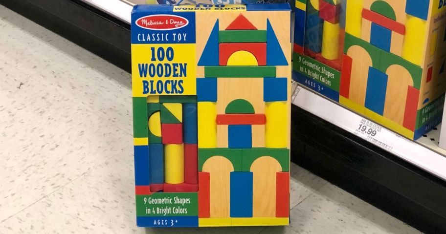 Melissa Doug Wood Blocks 100-count box on floor next to shelf at Target