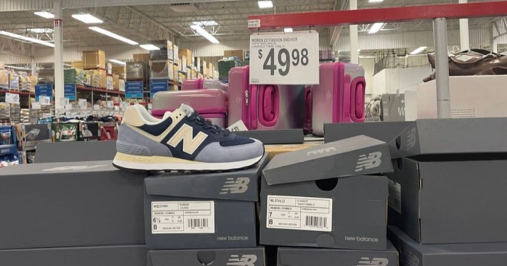 light blue, dark blue and light yellow New Balance Sneakers on display in store