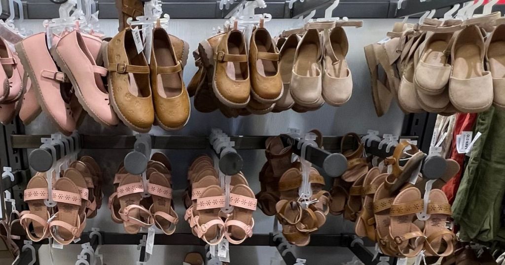 display of Old Navy Shoes and Sandals on hangers at the store