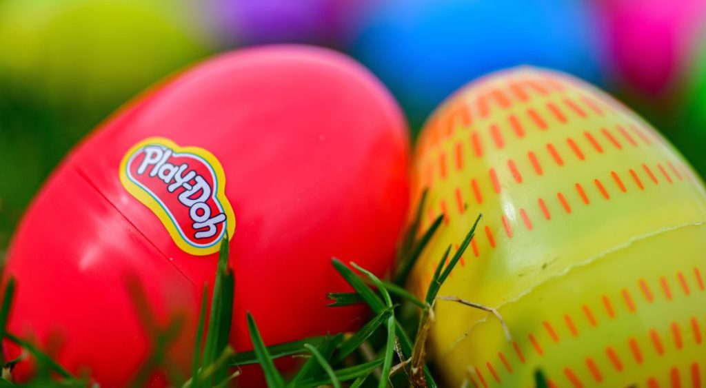 Close up view of Play Doh filled plastic easter eggs
