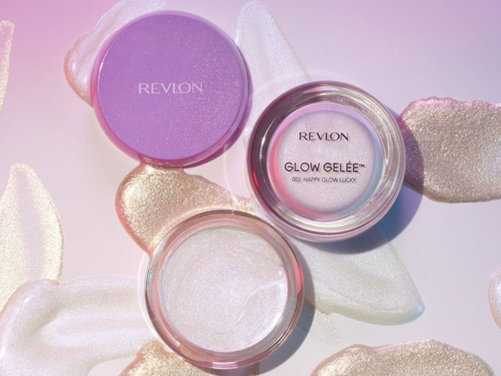 Lid and container from a Revlon Glow Gelee with streaks of the highlighter behind it