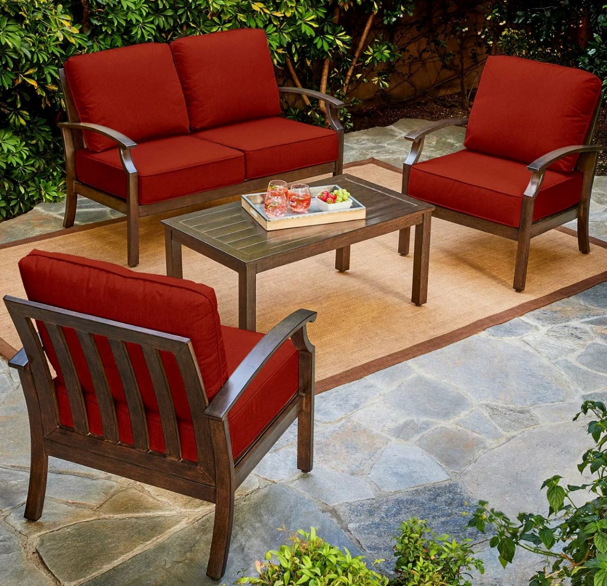 Patio with two chairs, loveseat, and coffee table