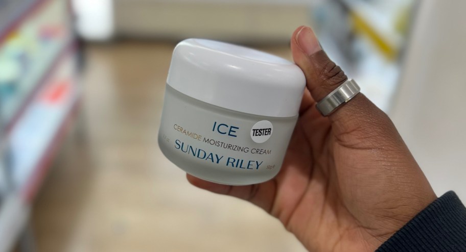 Sunday Riley Ice Ceramide Moisturizing Cream tester in woman's hands at ulta