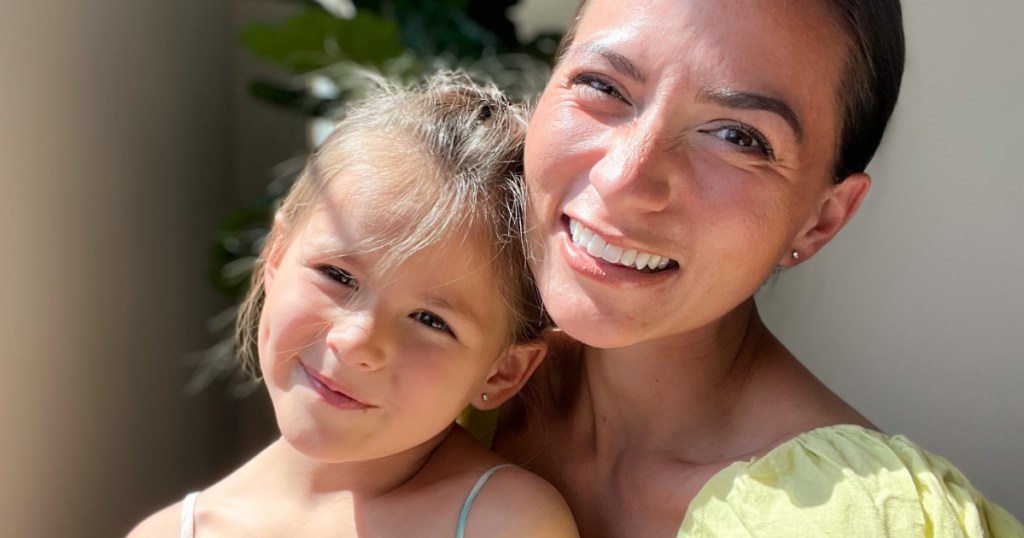 mother and daughter wearing diamond stu earrings