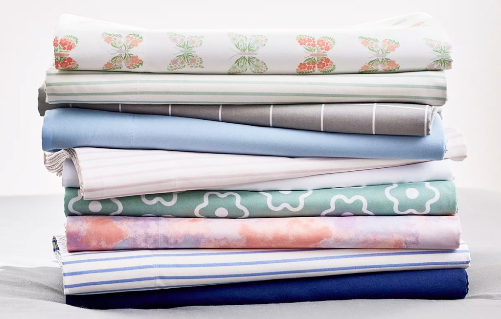 stack of folded sheets in various prints
