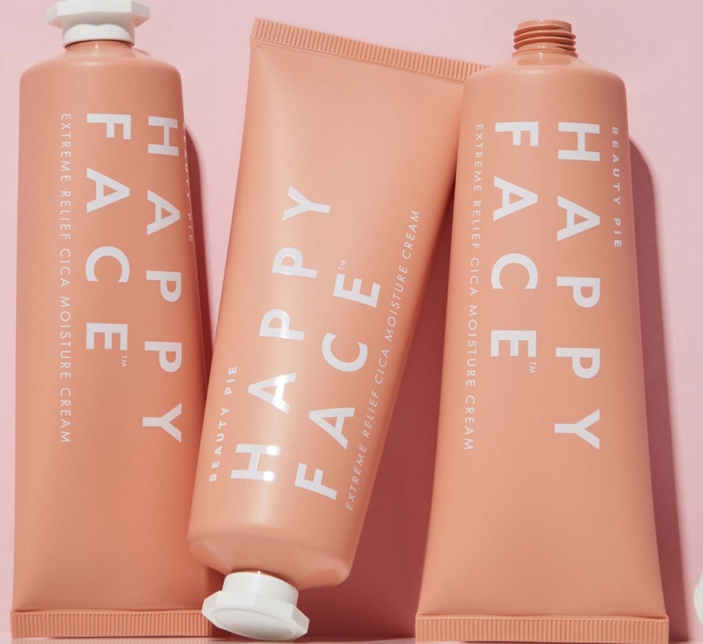 three tubes of happy face cream