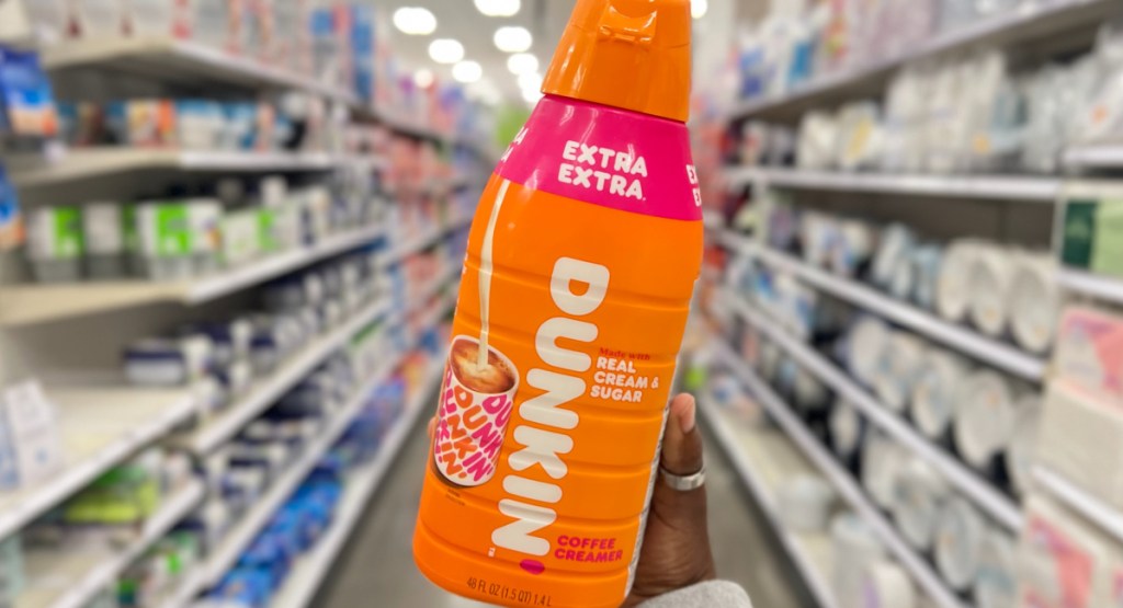 dunkin extra extra creamer in hand