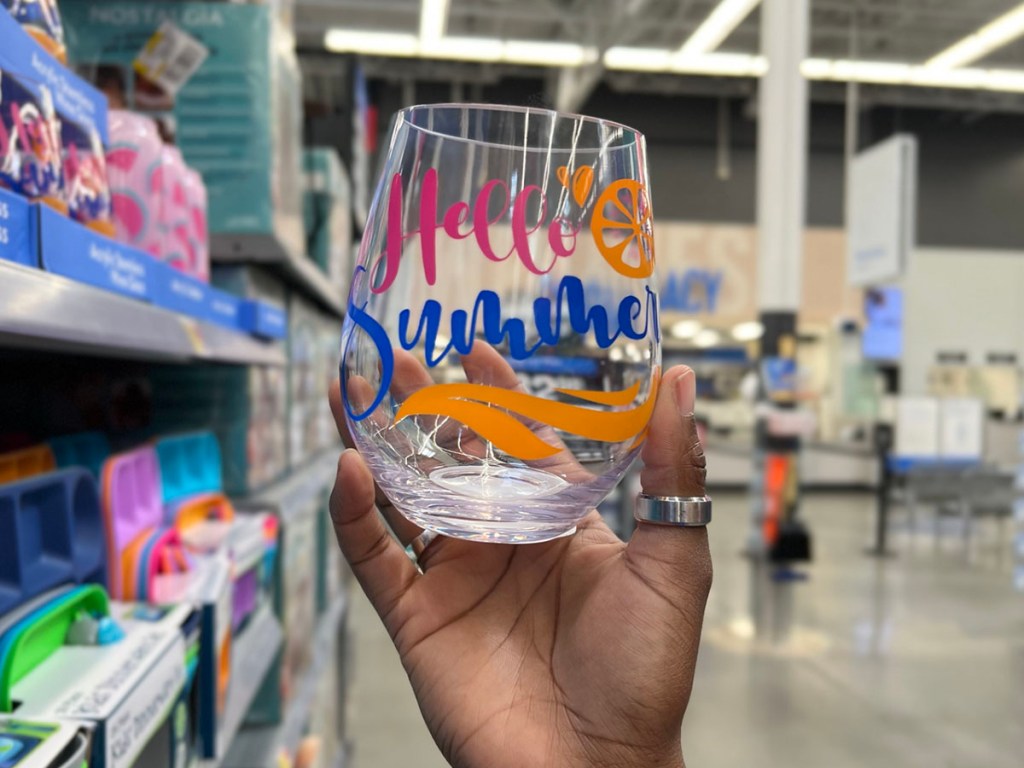 hand holding hello summer wine tumbler