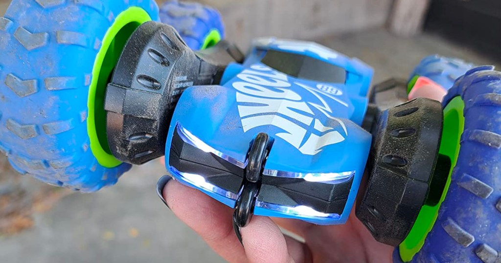 hand holding hot wheels rc twister vehicle