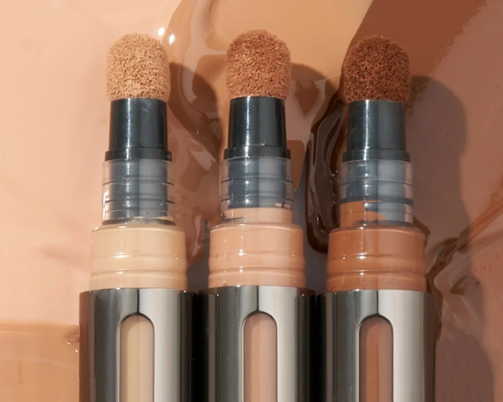 three complexion sticks in different shades