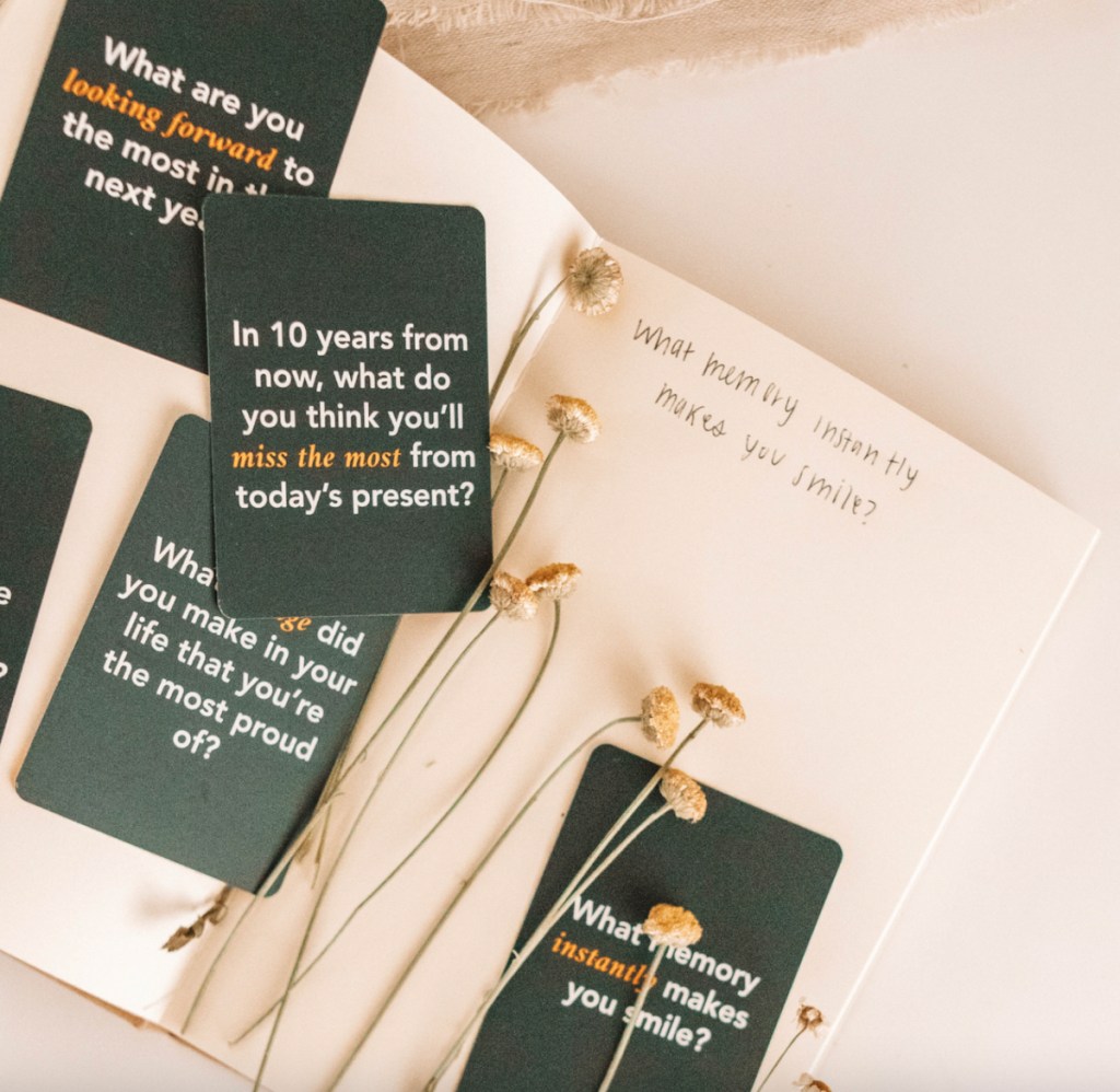 conversation starter questions cards on journal