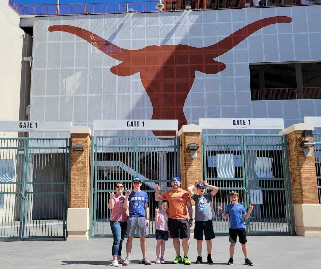 family standing outside of austin longhorns stadium