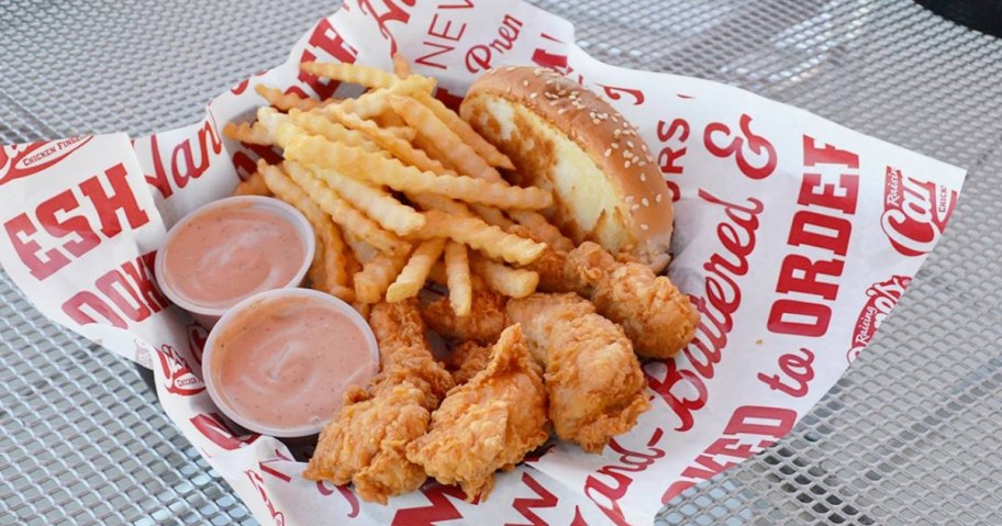 chicken fingers, fries, and 2 dipping sauces in a basket