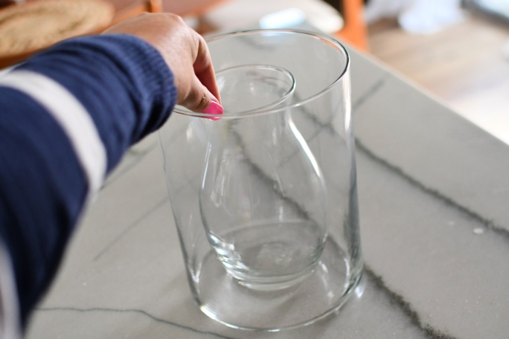 stacking a vases inside a larger vase