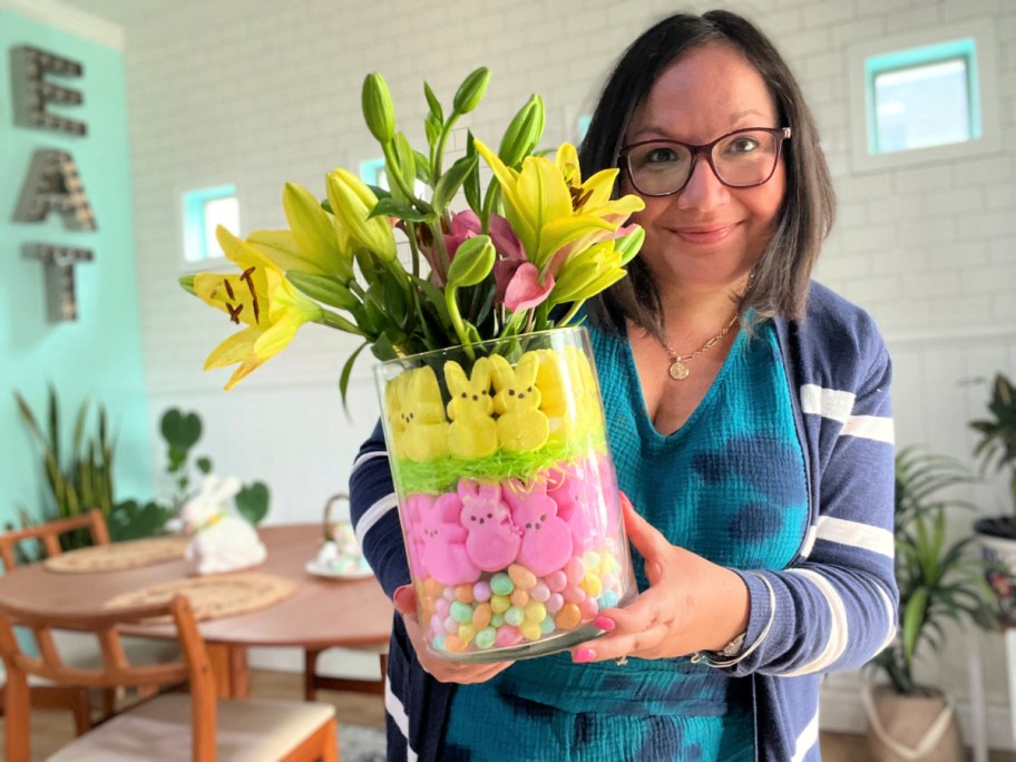 woman holding a peeps centerpiece