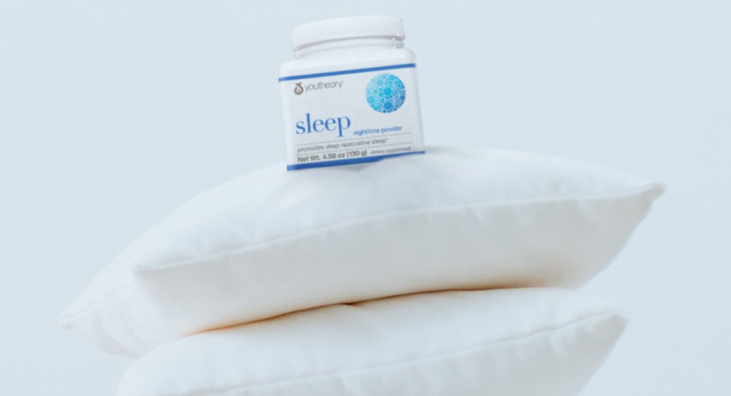 sleep powder on pile of pillows