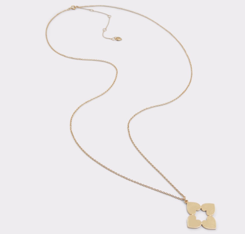 Gold necklace with four hearts in a square