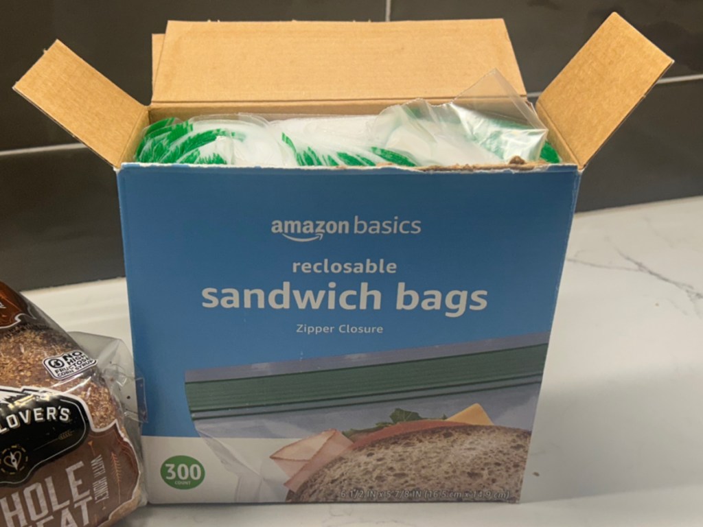 open box of Amazon Basics Sandwich Bags on counter