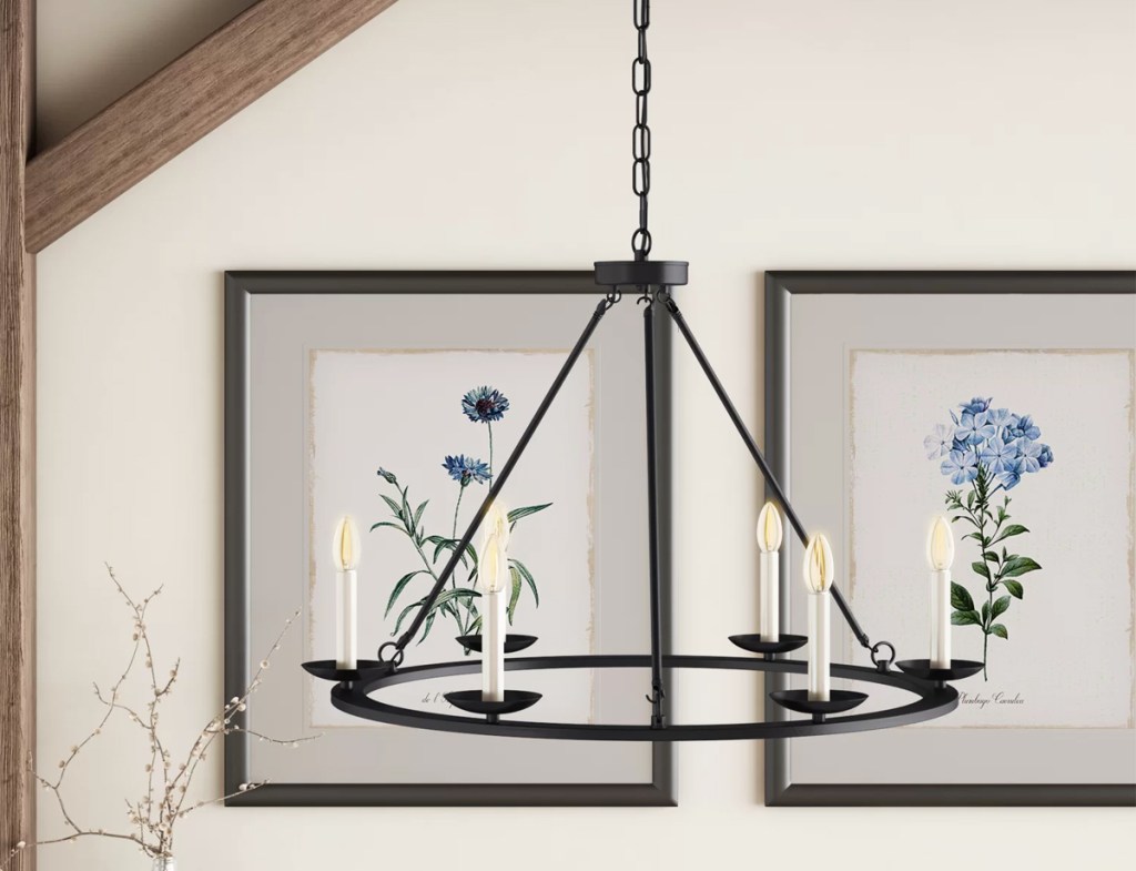 round black chandelier with 6 candle shaped lights