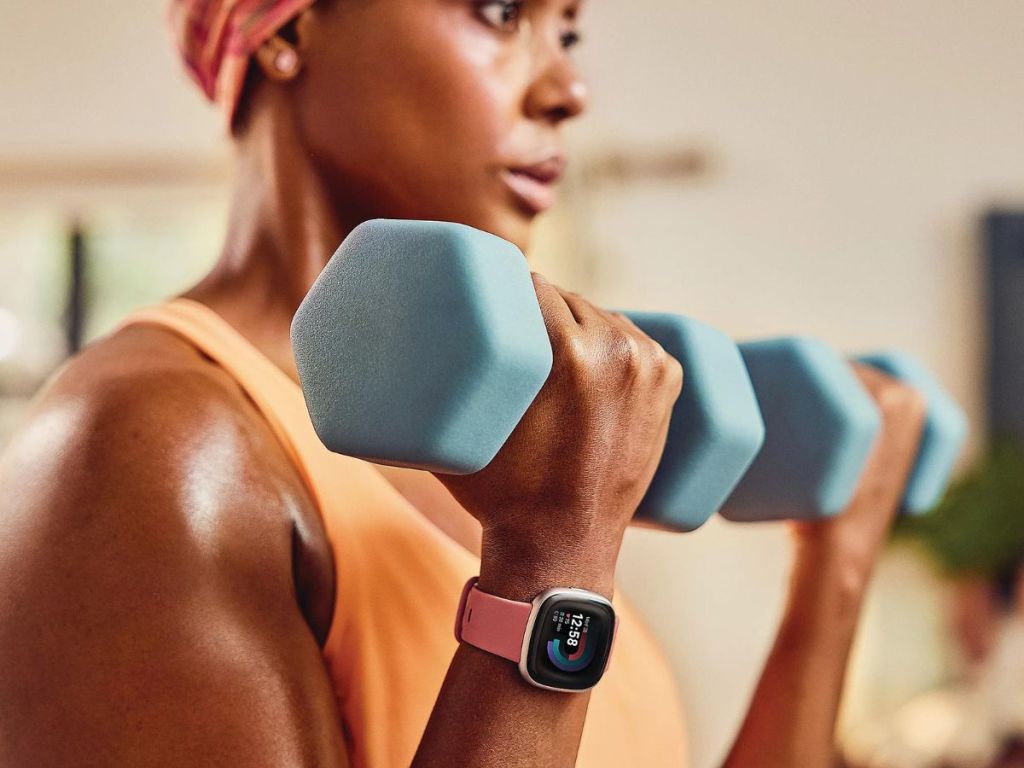 woman wearing fitbit watch