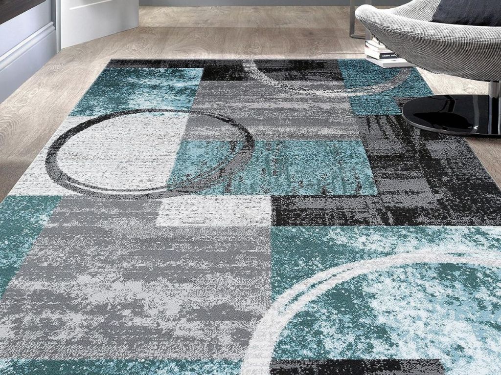 Stock photo of an area rug with a contemporary abstract design on it