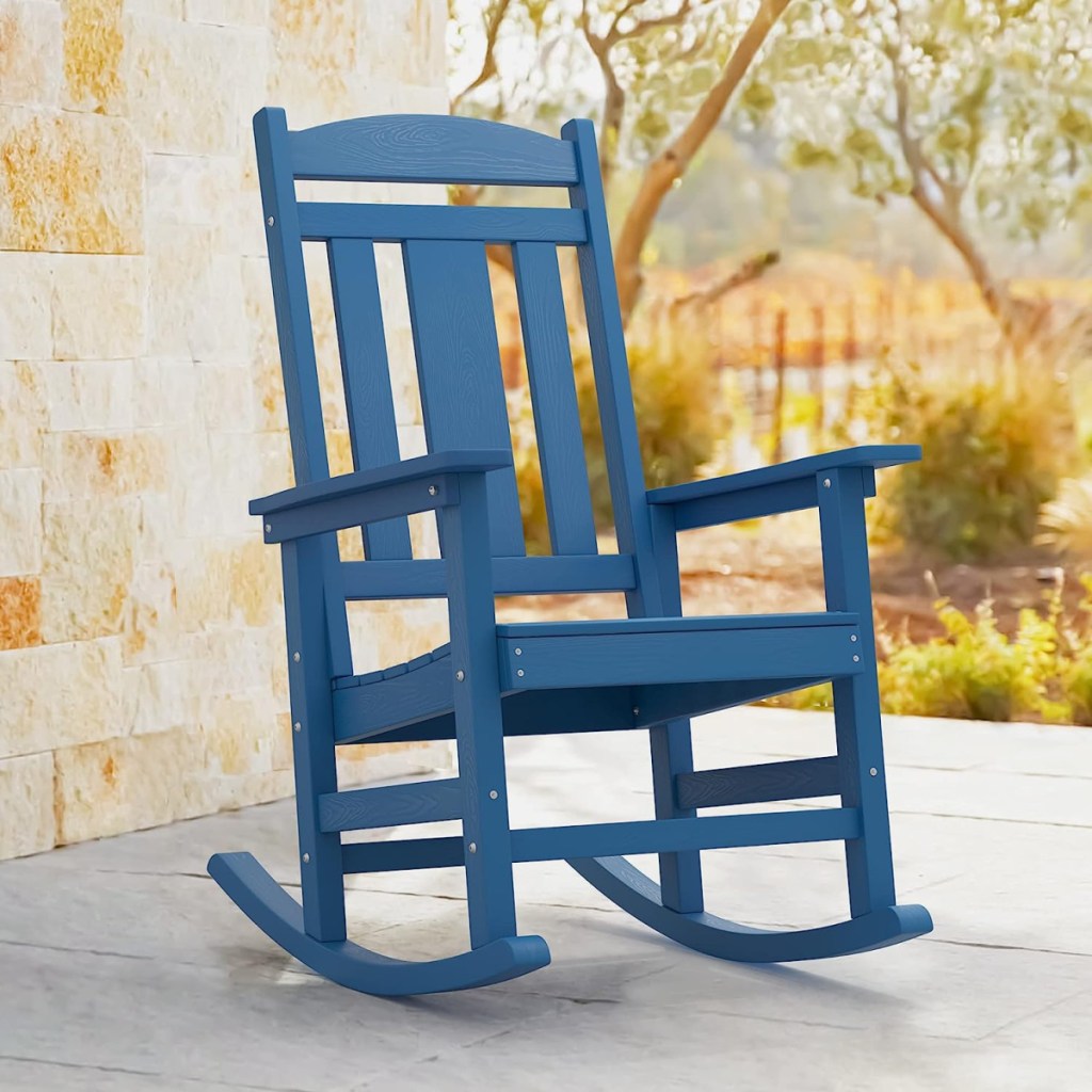 A blue outdoor rocking chair by Lue Bona