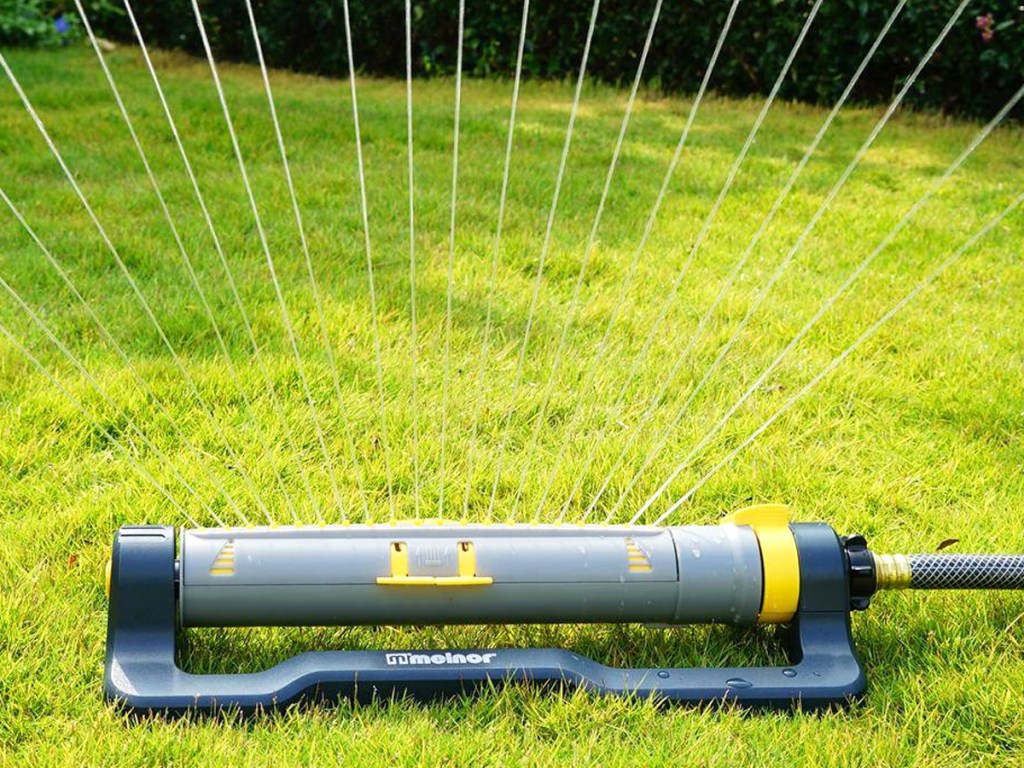 lawn sprinkler watering grass