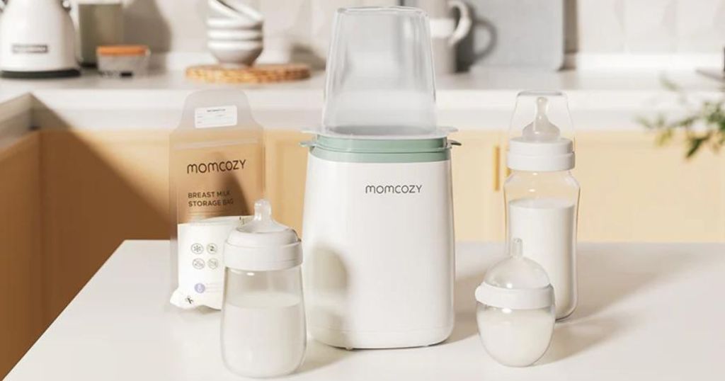 Momcozy Bottle Warmer with bag of breast milk, and 3 different types of bottles