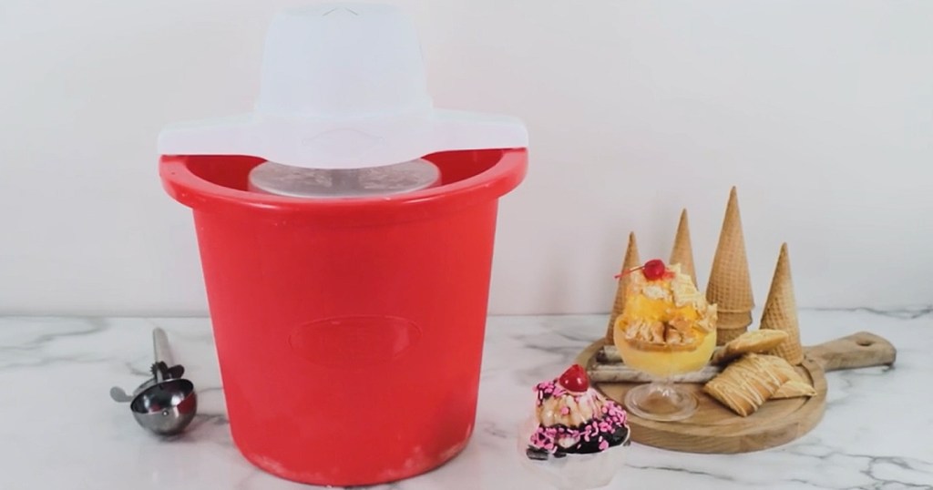 Nostalgia 4-Quart Electric Ice Cream Maker on counter next to bowl of ice cream