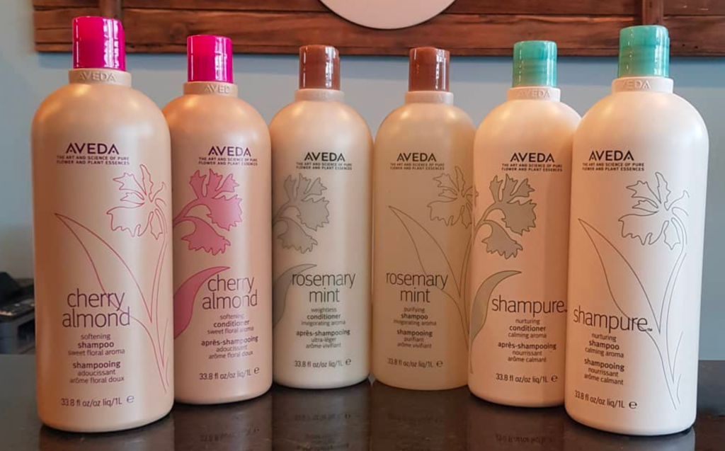 6 liter-sized bottles of shampoo and conditioners