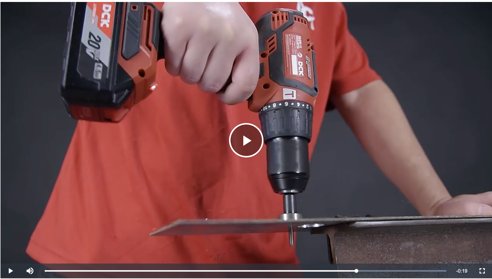 man using DCK brushless hammer drill