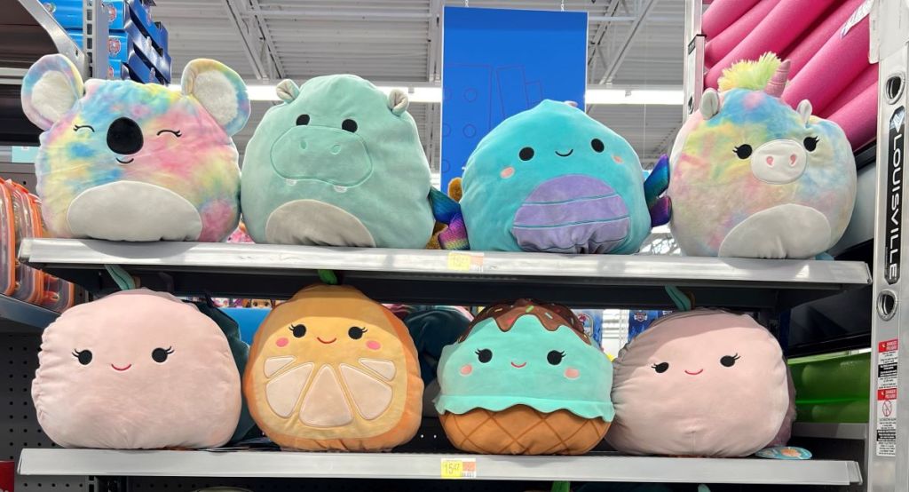 Two rows of Squishmallows on shelves at Walmart