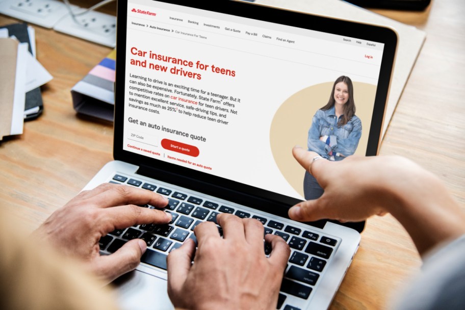 Two people looking at the State Farm Good Student Discount on their computer