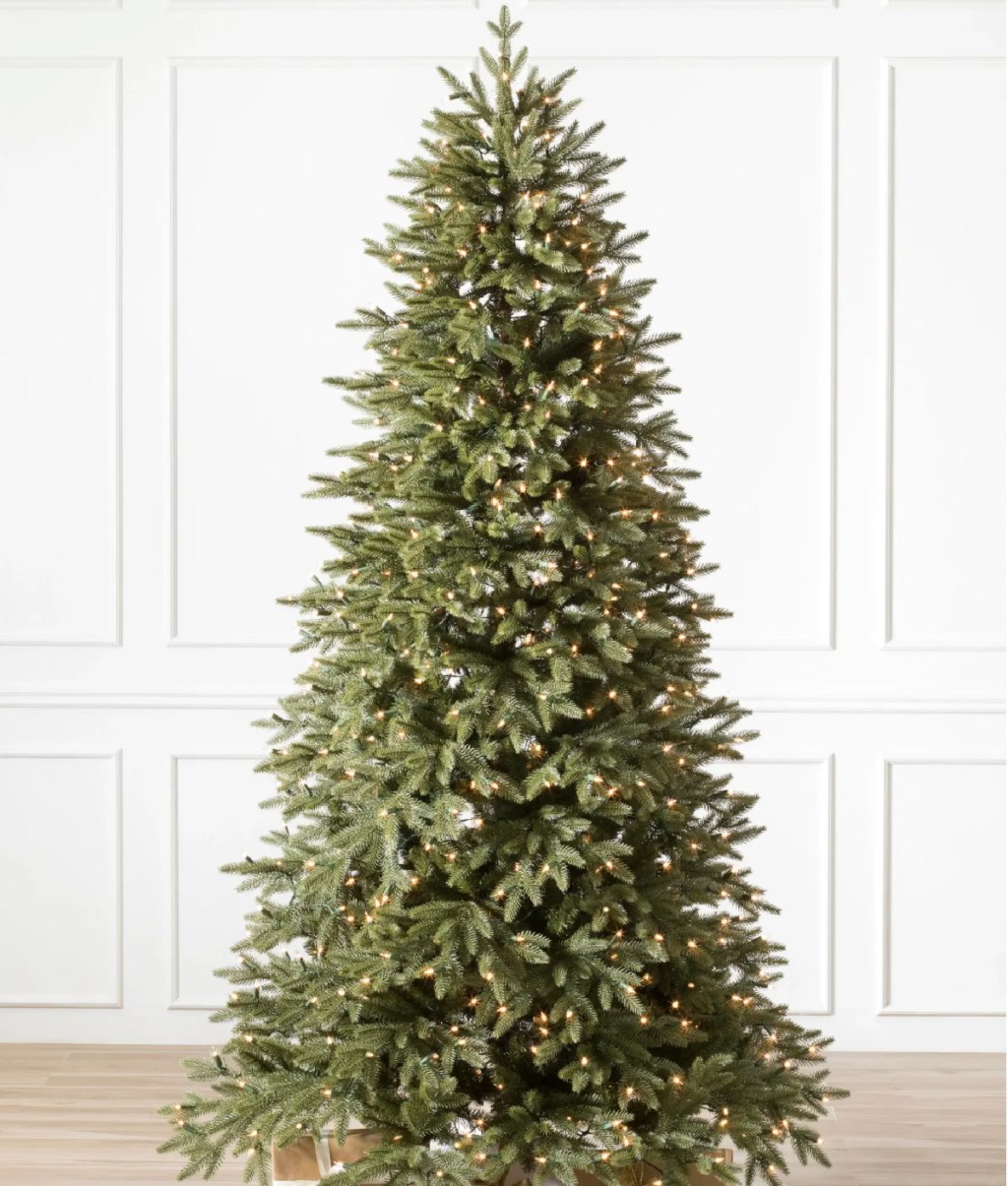 Stratford Spruce 6'5ft Christmas Tree w_ Clear Lights with gifts underneath