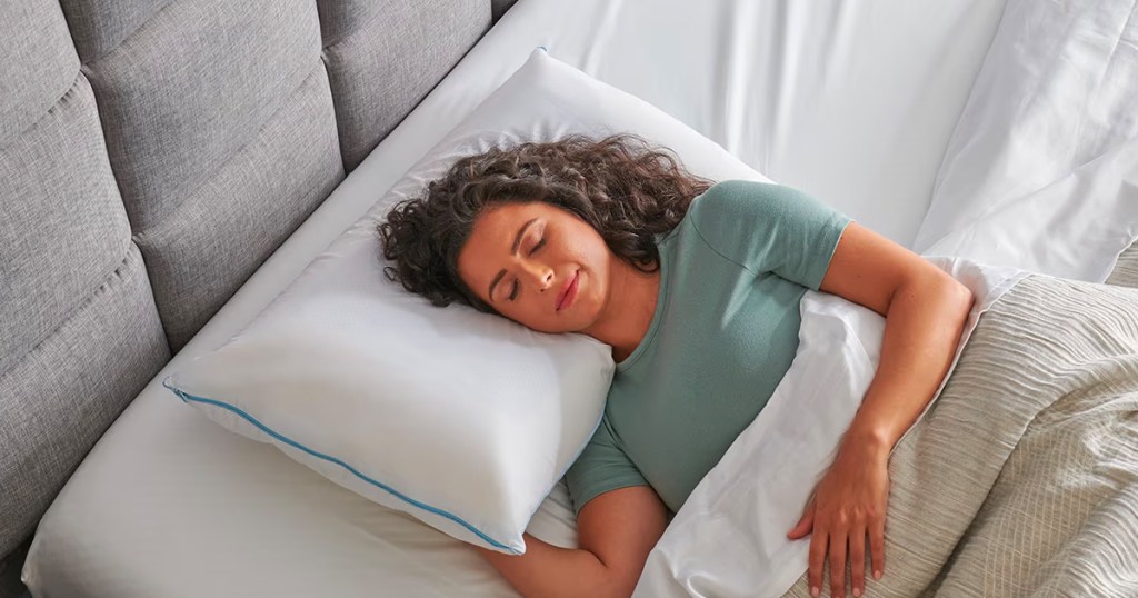 woman sleeping on a TEMPUR-Cloud Adjustable Pillow