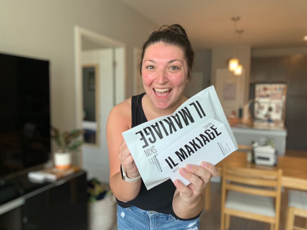 Woman about to open a package of beauty products