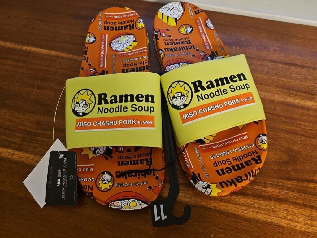 A pair of slides with Ramen artwork on them 