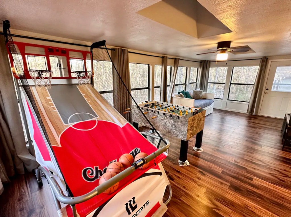 basketball hoop inside with foosball table