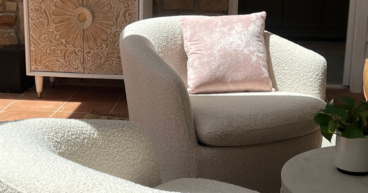 ivory swivel chairs on sun porch