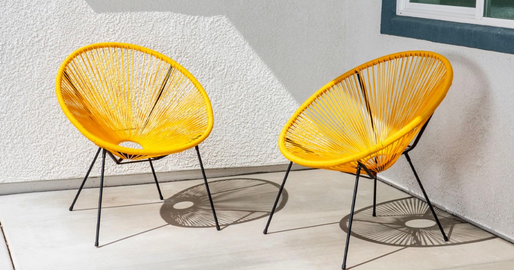 two yellow rope chairs on patio