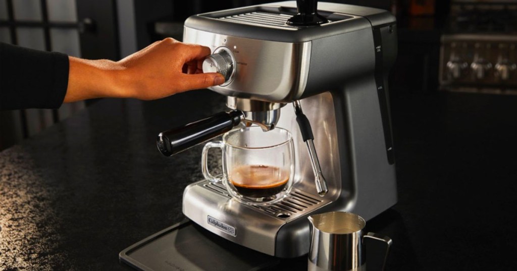 hand making espresso with calphalon espresso machine