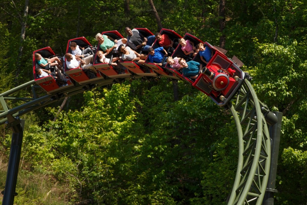 red roller coaster on a gray track