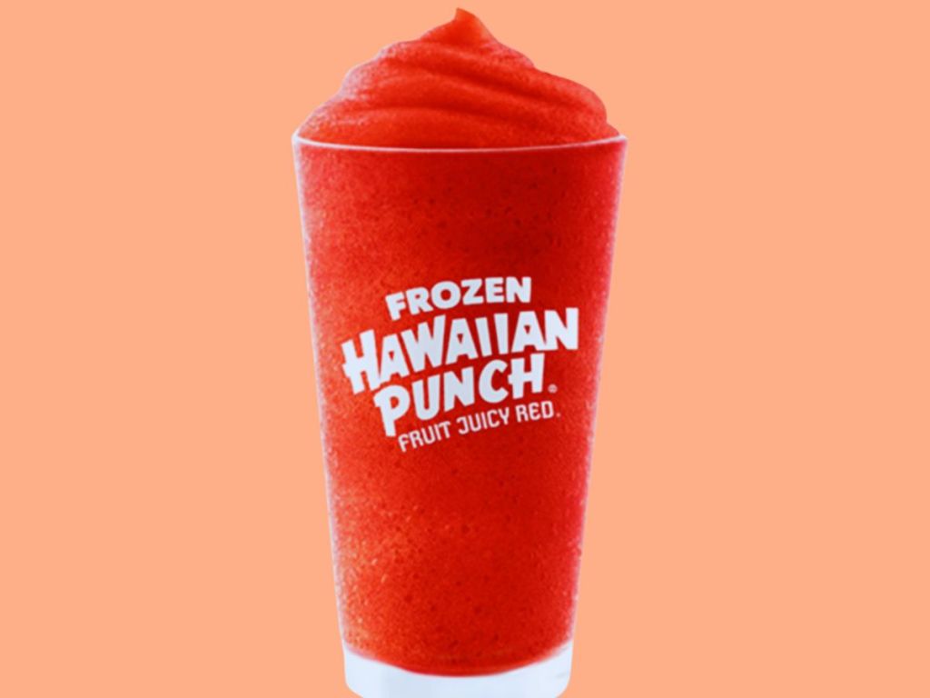 glass of frozen Hawaiian Punch with orange background