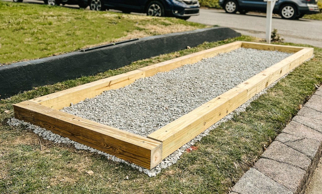 timbers laying on rockbed in yard